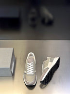 Prada unisex sneakers in light beige with white laces and dark tread soles