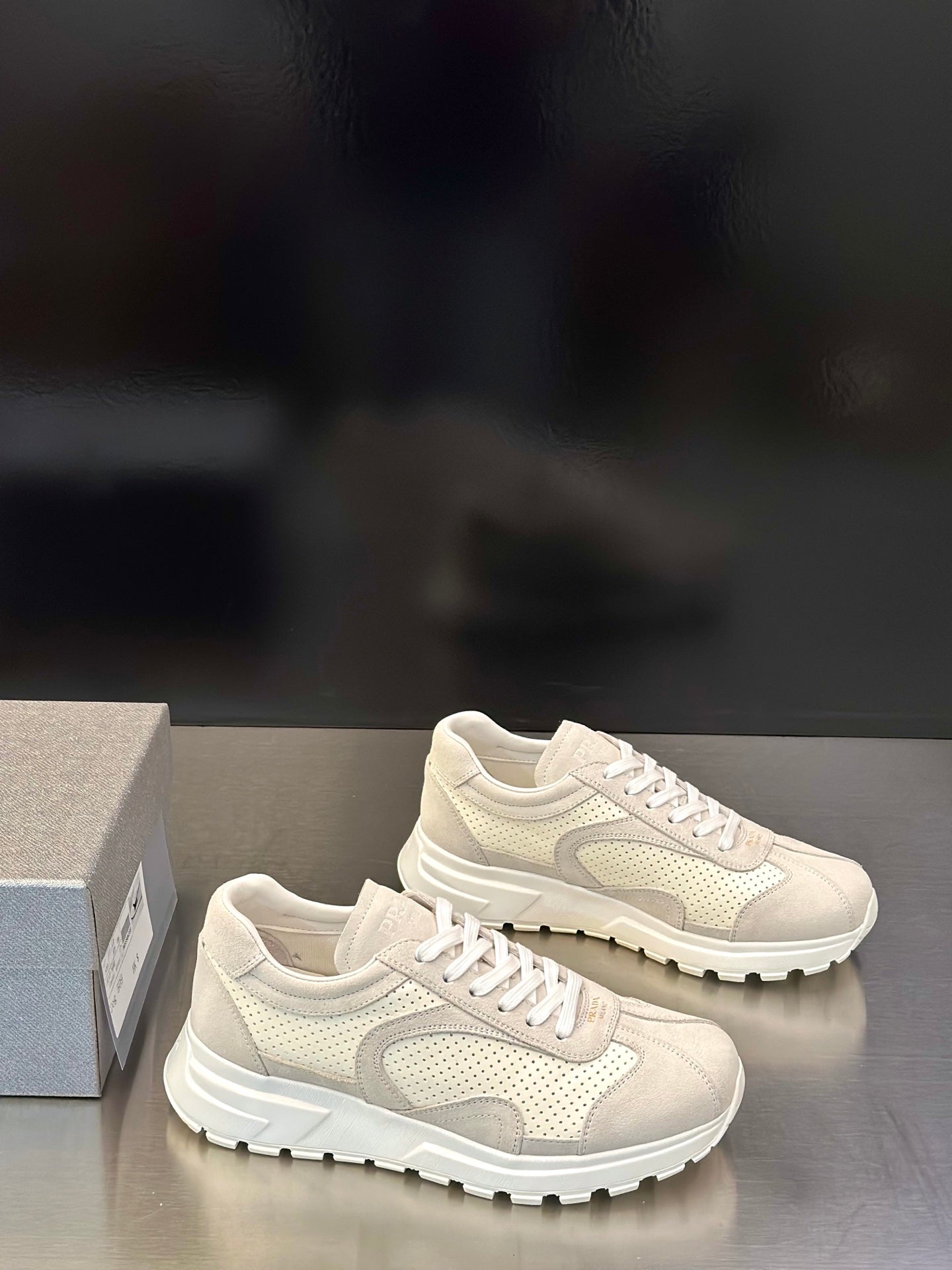 Prada unisex sneakers in light off-white, chunky sole and lace-up front