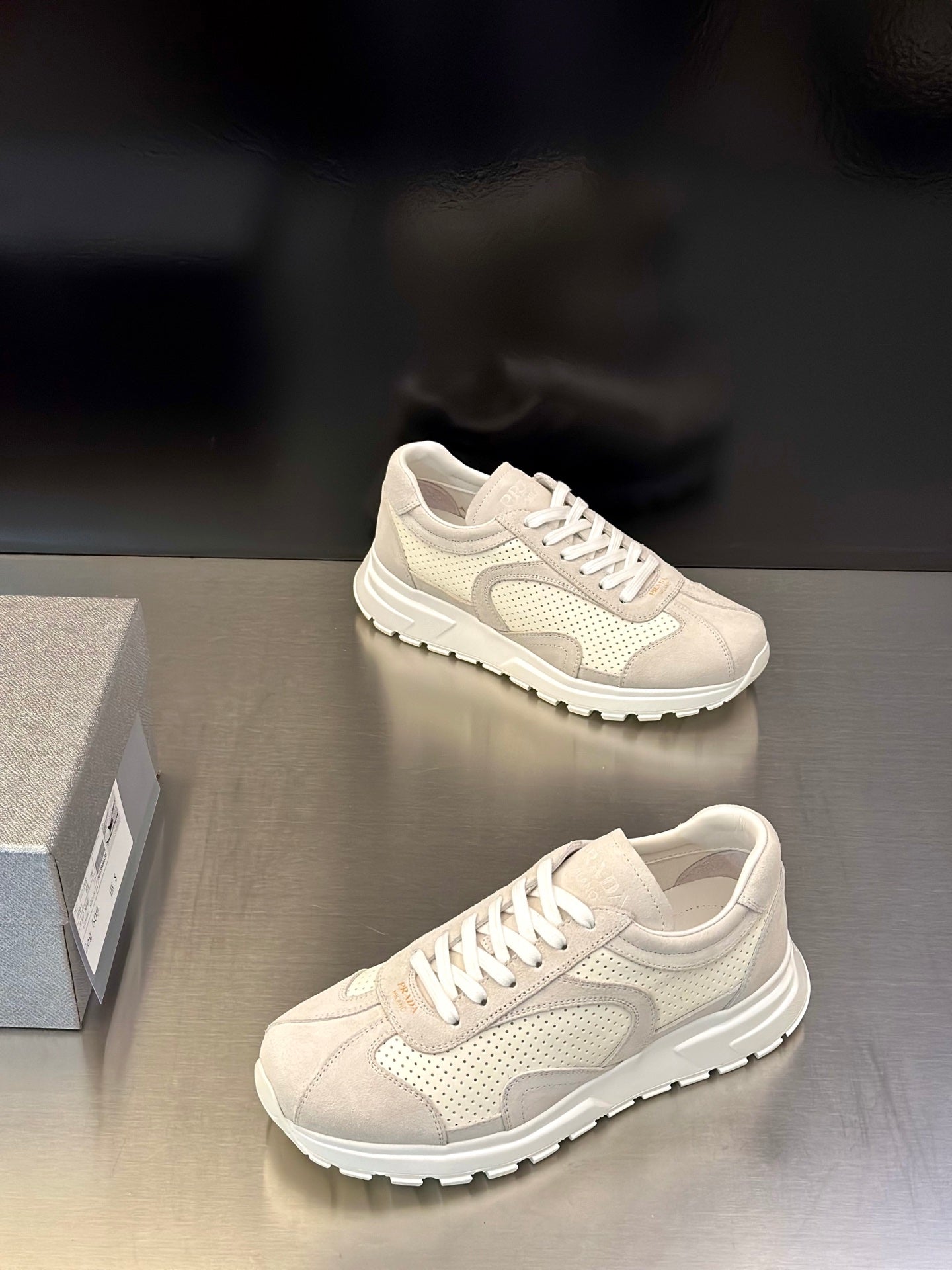 Prada unisex sneakers, light off-white lace-up style with textured side panel