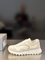 Prada unisex low-top sneakers in light off-white with lace-up closure