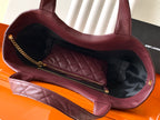 YSL quilted tote bag open top with dark interior lining, burgundy leather