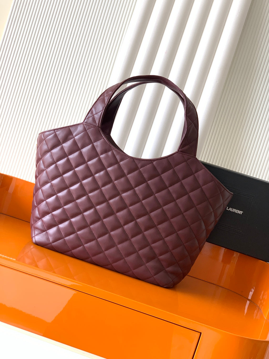 YSL quilted tote bag with top handles, burgundy leather and gold logo detail