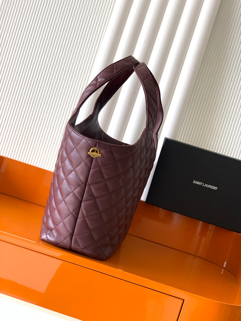 YSL quilted tote bag with top handles and side strap, burgundy leather