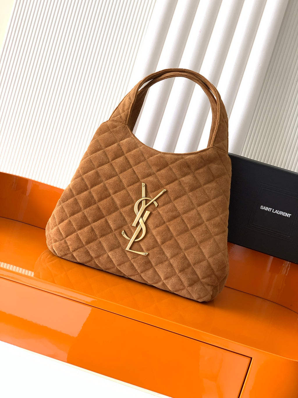 YSL quilted handbag in tan suede with top handle and YSL logo hardware