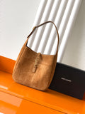 Tan suede hobo bag with top handle and front logo detail