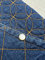 Denim jacket gold button with blue-and-gold lattice embroidery