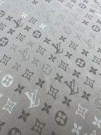 Louis Vuitton monogram T-shirt fabric close-up, light beige all-over icons