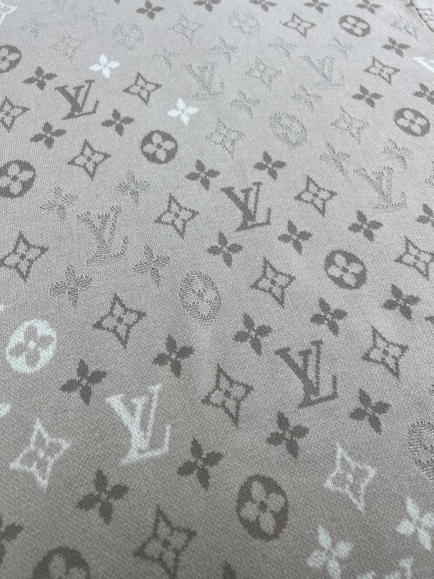 Louis Vuitton monogram T-shirt fabric close-up, light beige all-over icons