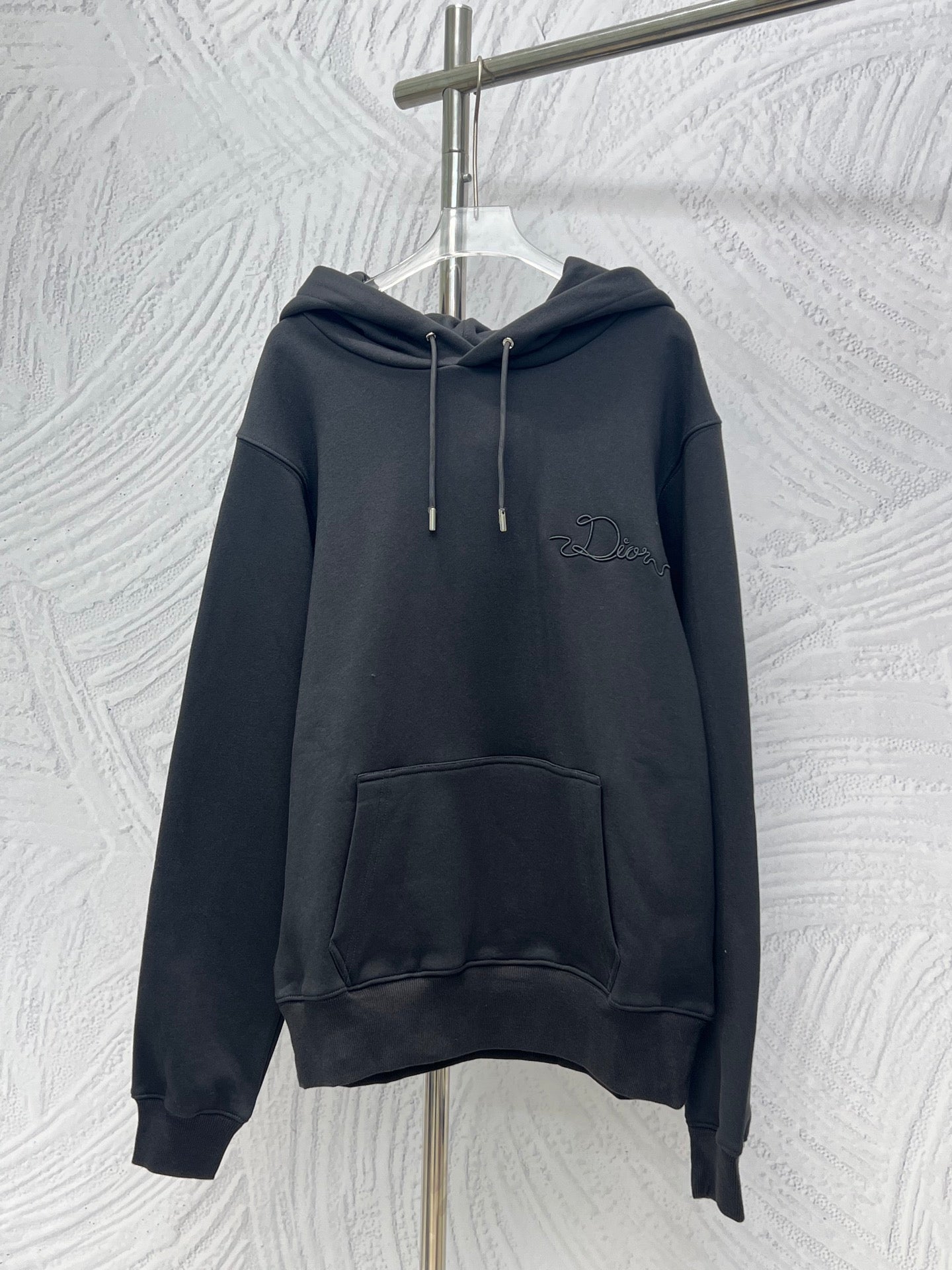 Dior long-sleeve hoodie in dark navy with front kangaroo pocket and drawstring hood