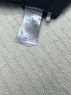 Dior long pants label on waistband, size S and fabric care details
