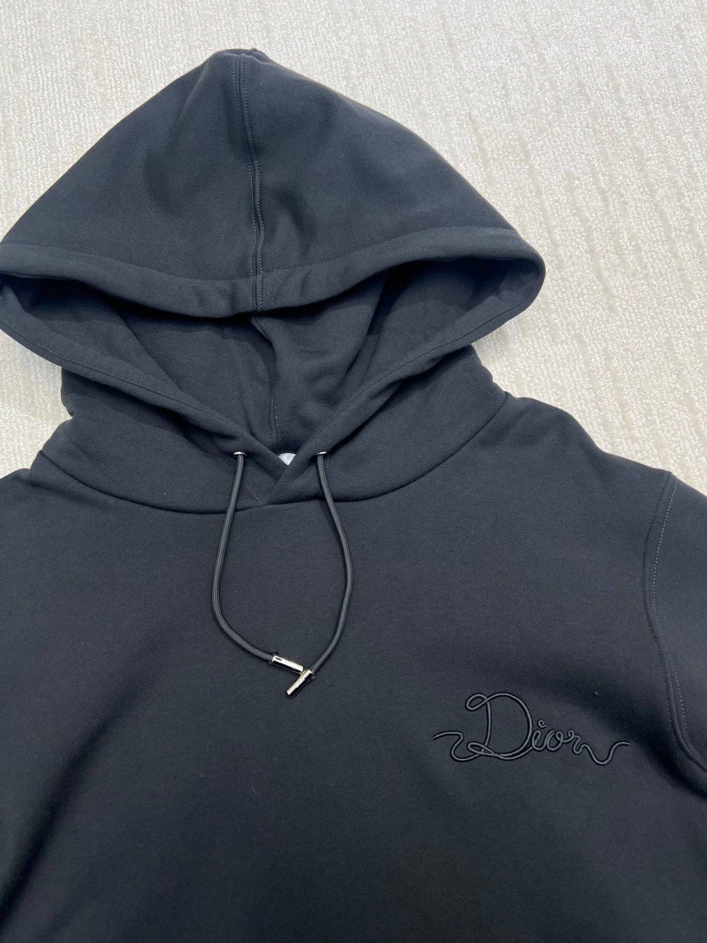 Dior dark navy hoodie with hood and drawstring, stitched logo on chest