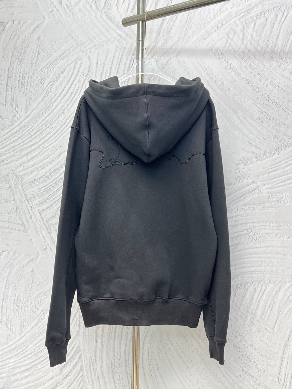 Dior long-sleeve hoodie in dark navy, back view with hood and kangaroo pocket