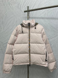 Long puffer jacket with front zip, light pink color and padded hood.