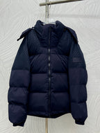 Navy hooded puffer jacket with full zip and quilted panels, long sleeves
