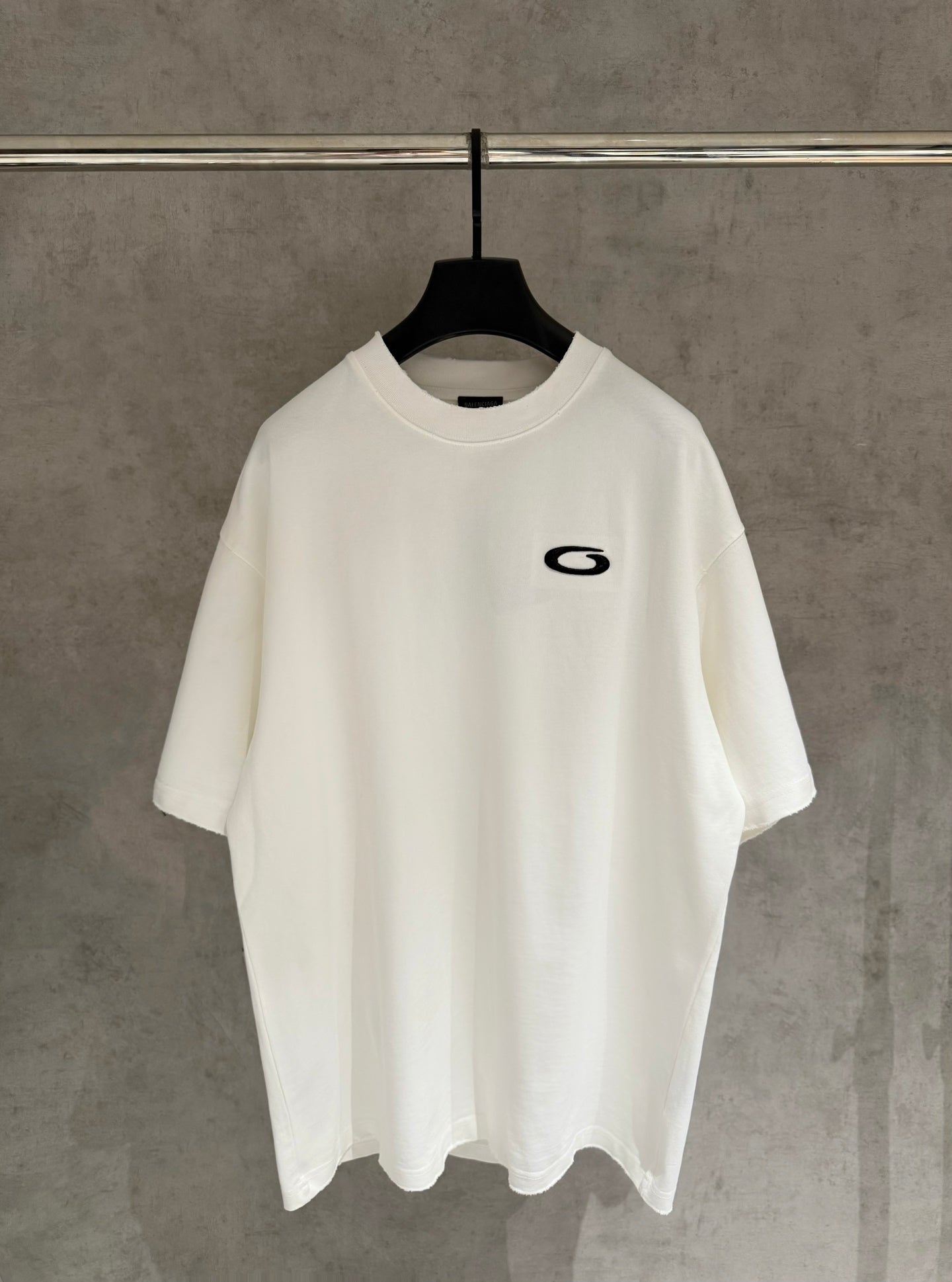 Balenciaga white T-shirt with small black logo at chest