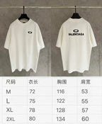 Two Balenciaga white T-shirts on hangers with front and back logos