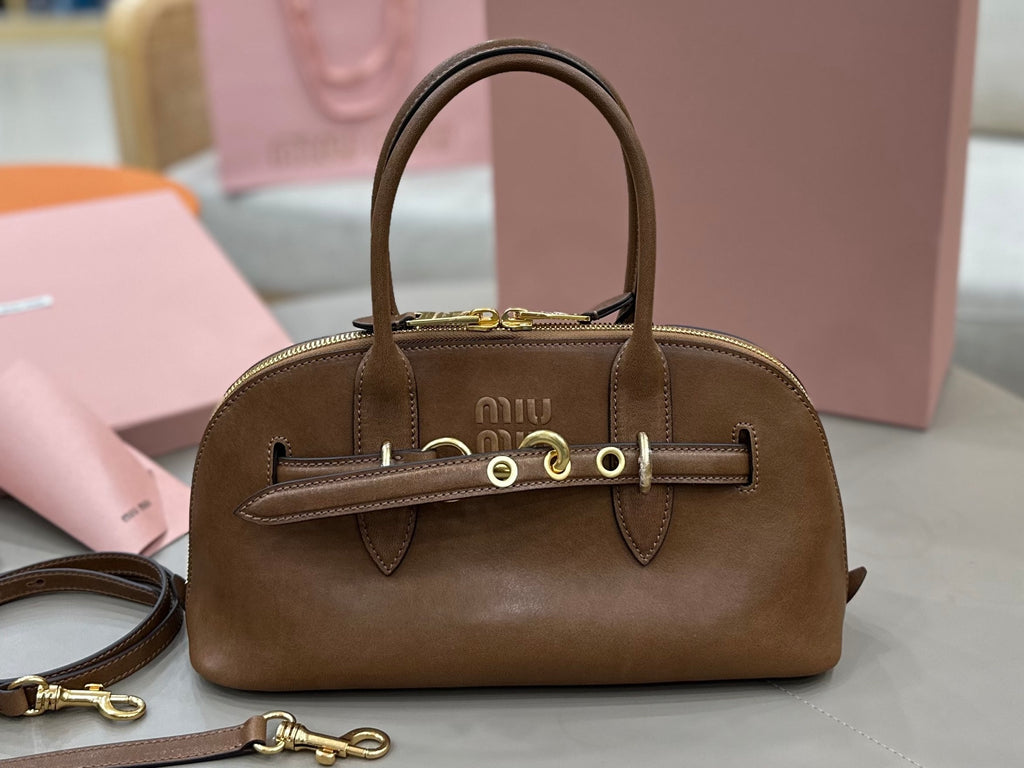 MiuMiu brown leather handbag with top handles and front logo plaque