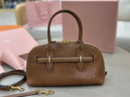MiuMiu brown leather handbag with front strap detail and top handles
