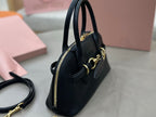 MiuMiu mini bag, black with side zipper pocket and gold hardware accents