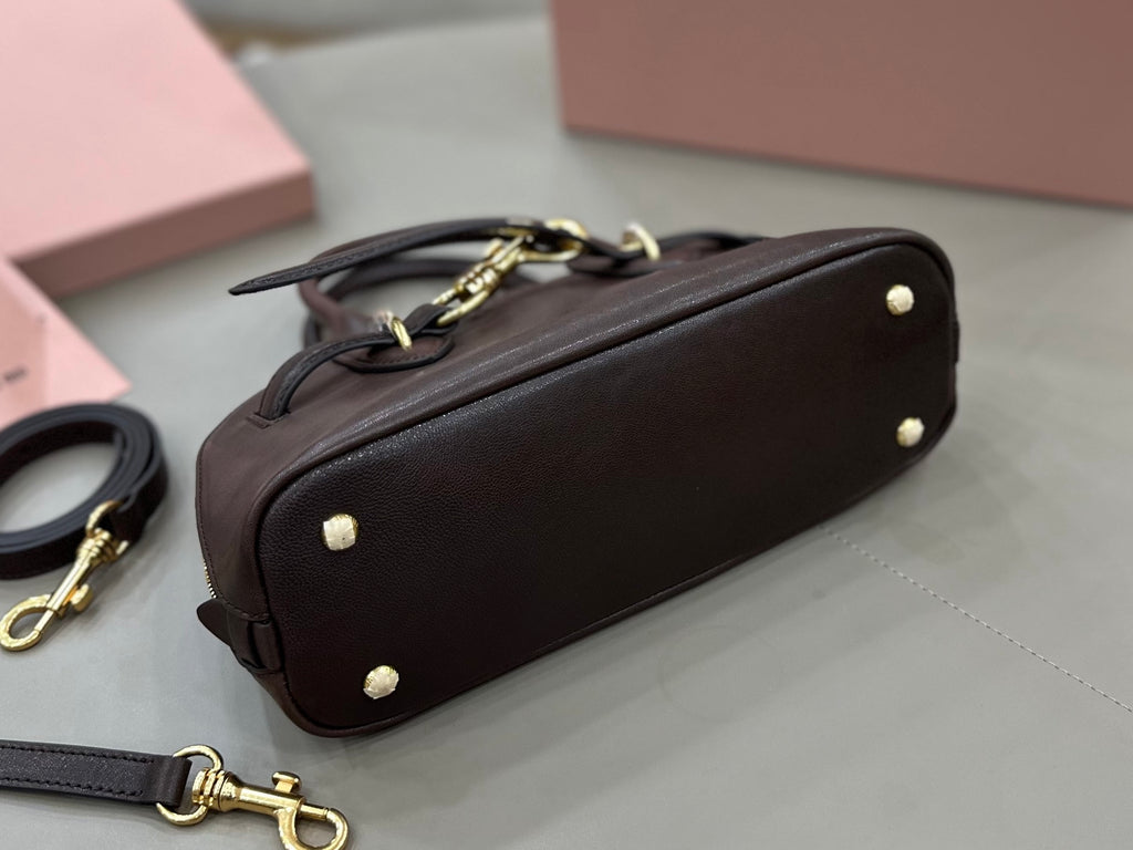 MiuMiu handbag with top handle and detachable strap, gold-tone hardware, dark brown