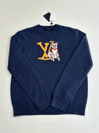 Navy knit crewneck sweater with long sleeves and front cat graphic in yellow and white