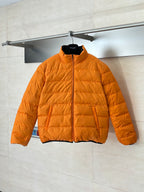 Gucci long puffer jacket in bright orange, full-zip front and stand collar