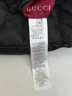 Gucci long padded jacket size tag, inner label with Gucci branding