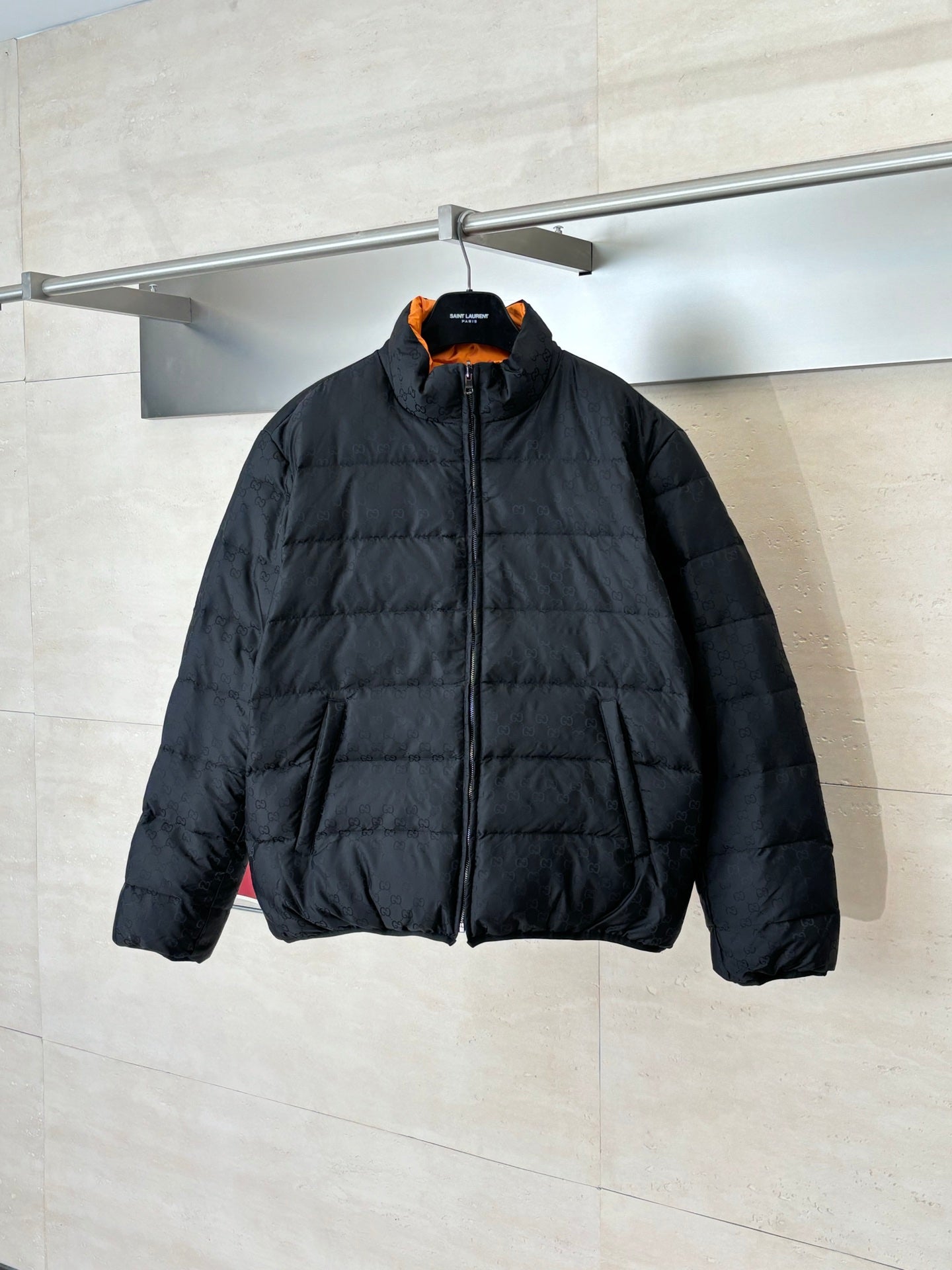Gucci long puffer jacket in dark navy, full-zip front and stand collar