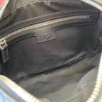 Gucci bag interior lining with leather tab and snap pocket