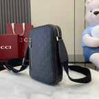 Gucci crossbody bag, embossed monogram fabric, rounded body and shoulder strap
