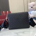 Gucci messenger bag, dark navy GG monogram leather, zip top, adjustable strap