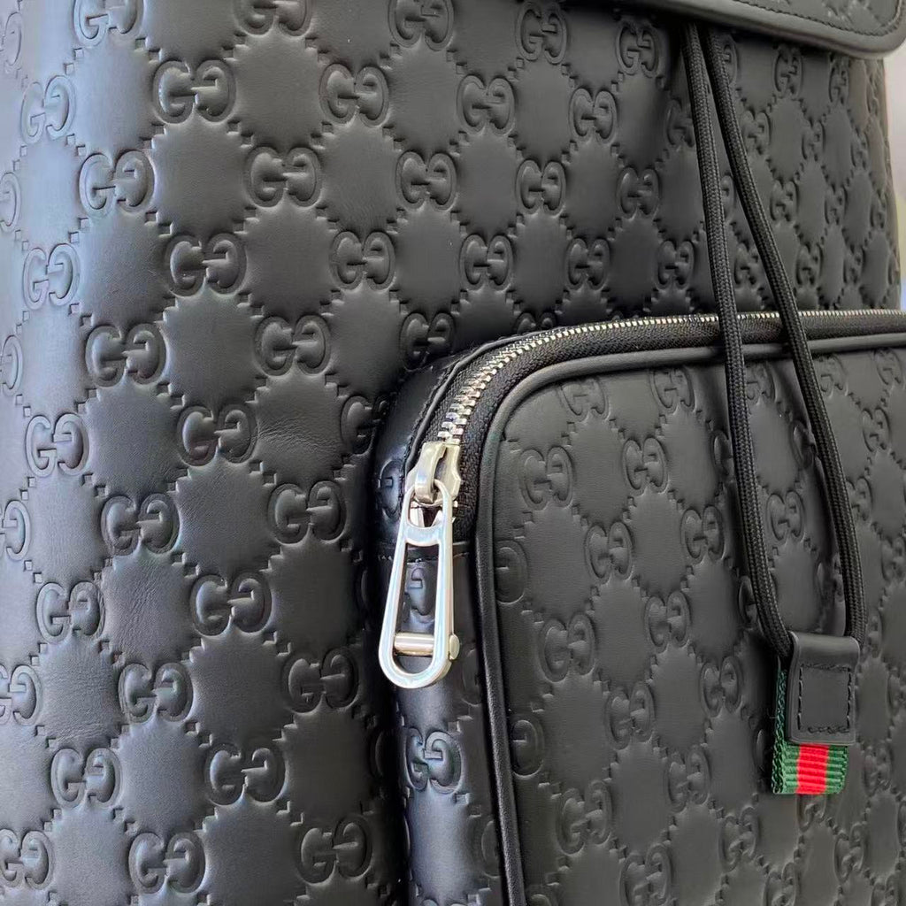 Gucci bag fabric with embossed GG monogram pattern and zip pocket trim, light blue-gray