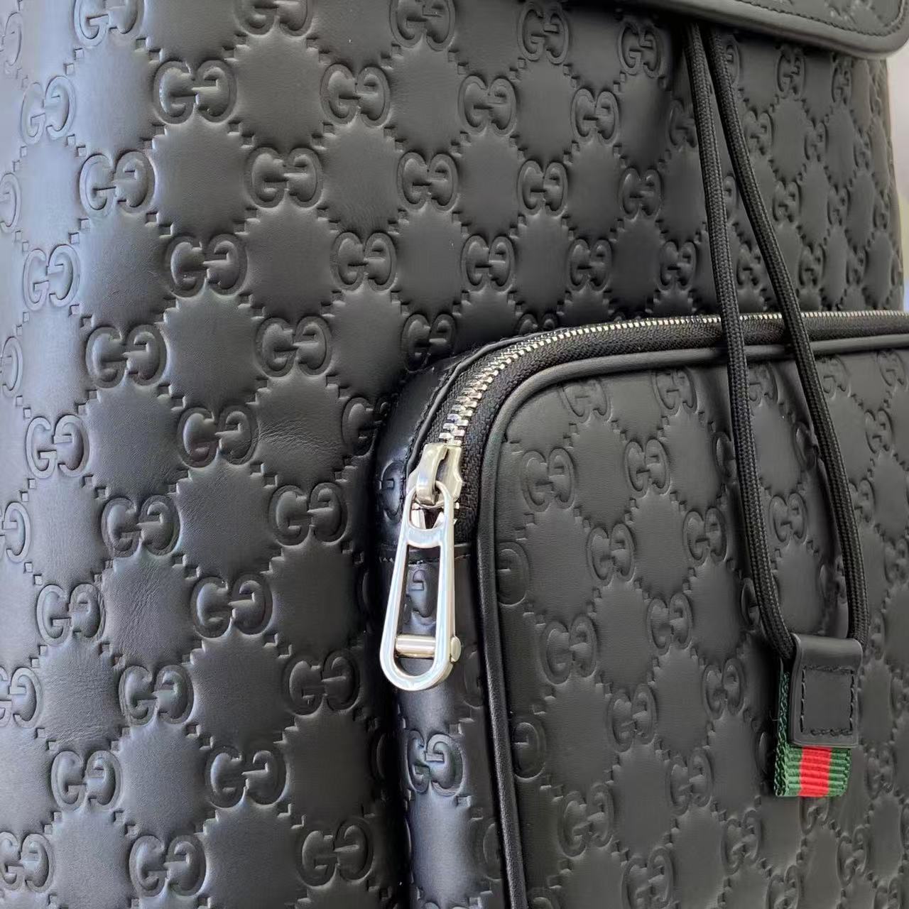 Gucci bag fabric with embossed GG monogram pattern and zip pocket trim, light blue-gray