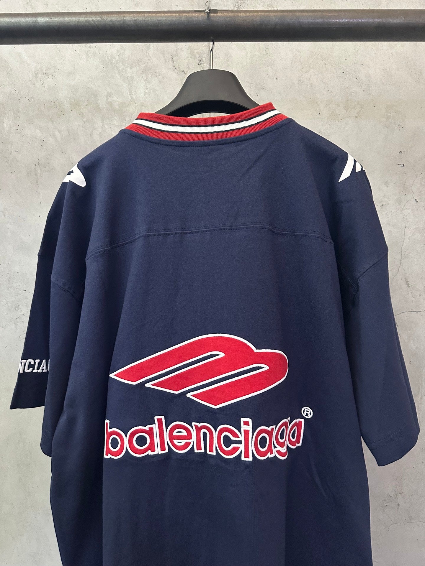 Navy short-sleeve polo shirt with back red Balenciaga graphic logo