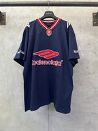 Navy short-sleeve polo shirt with red Balenciaga logo and striped V-neck trim