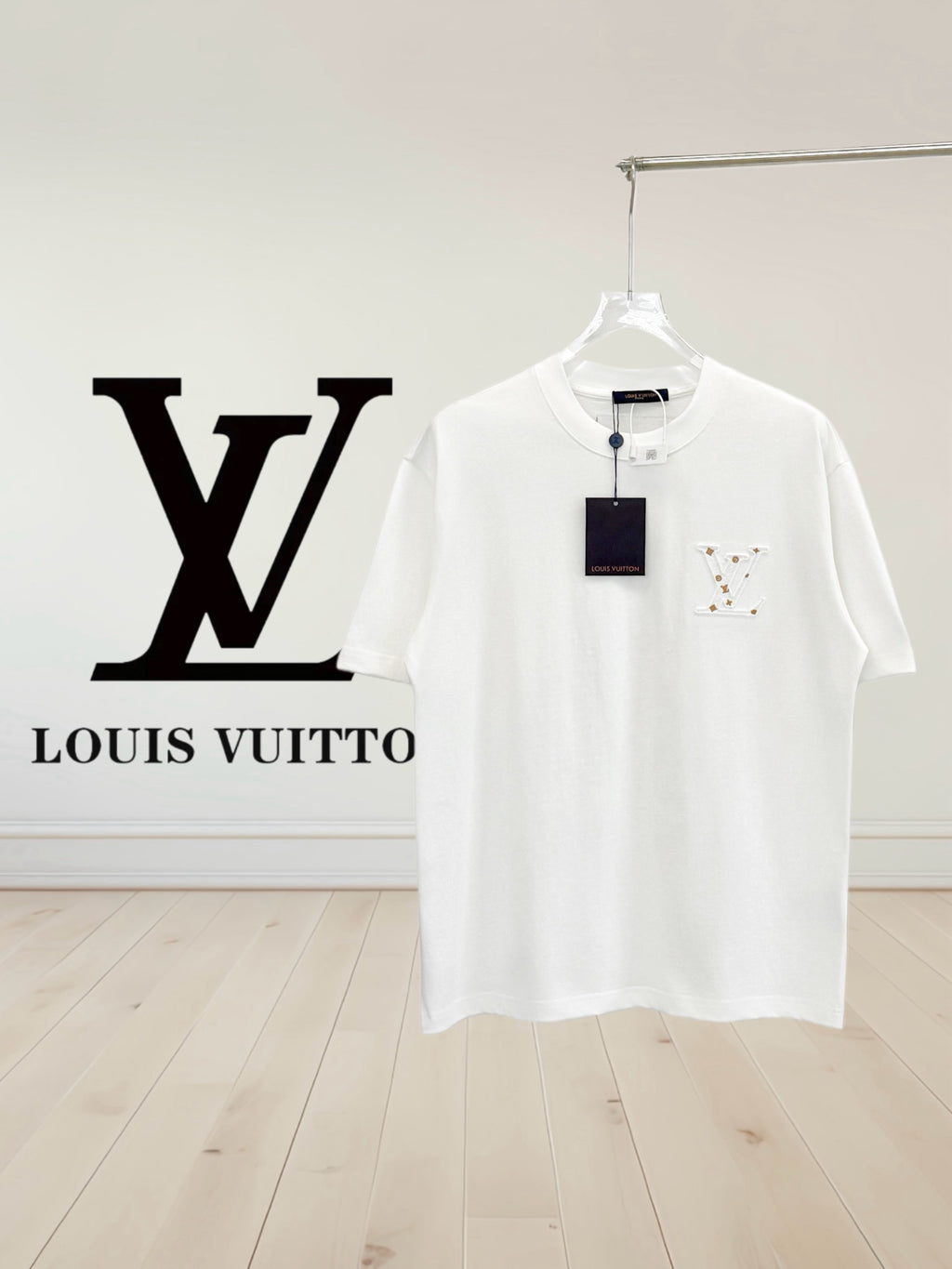White T-shirt with crew neck and small multicolor chest logo detail