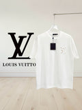 White T-shirt with crew neck and small multicolor chest logo detail