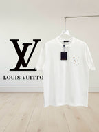 White T-shirt with crew neck and small multicolor chest logo detail