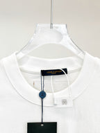 White T-shirt neckline with brand hang tag and inner neck label