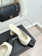 Chanel ladies mule heel, white upper with black patent front detail and block heel