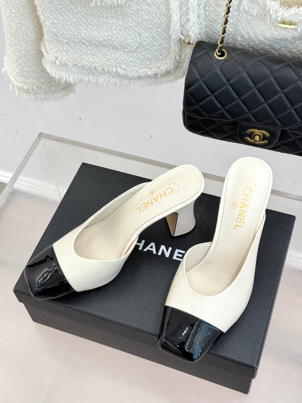 Chanel ladies mules on box, white with black glossy toe, chunky mid heel
