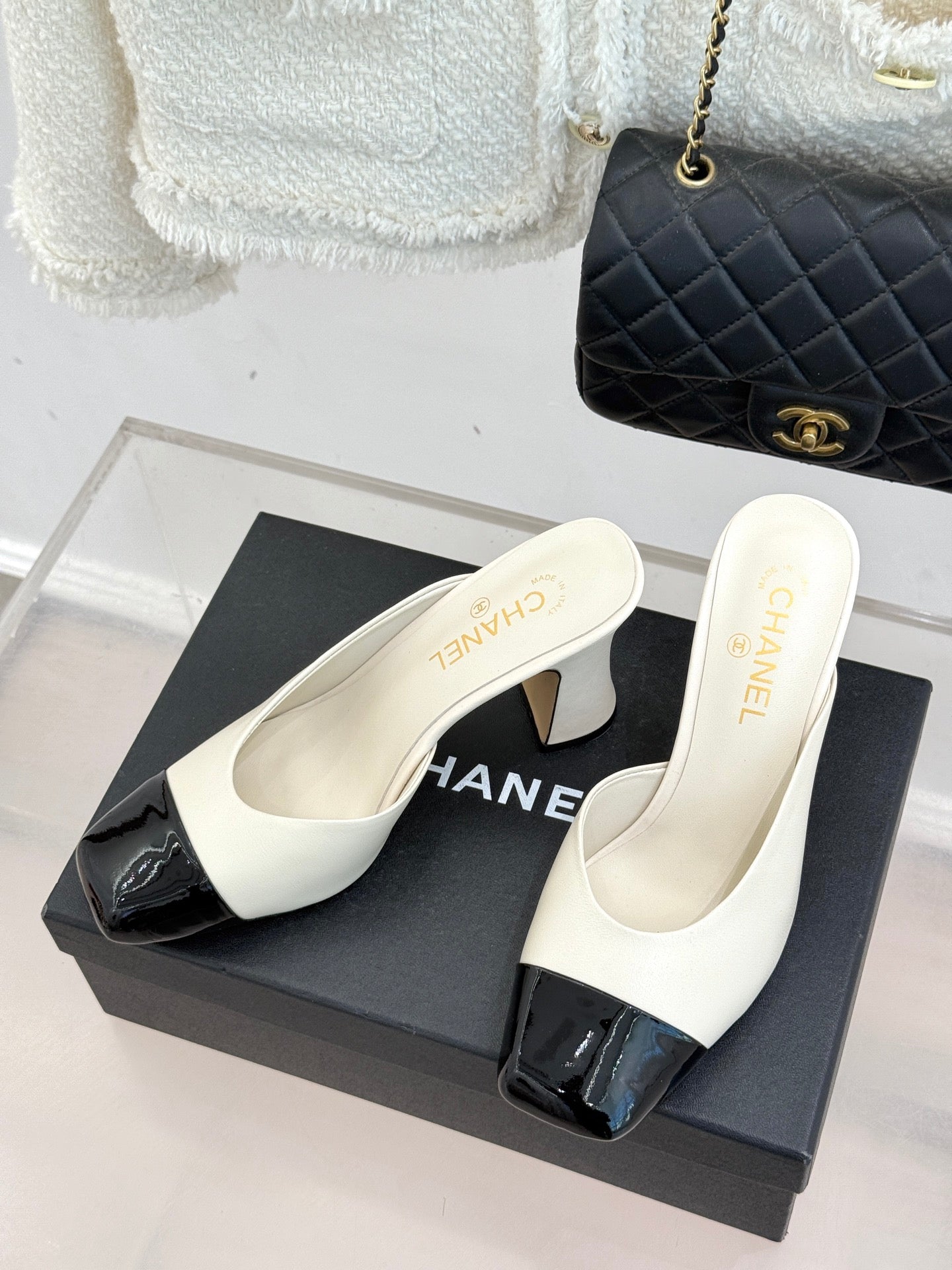 Chanel ladies mules on box, white with black glossy toe, chunky mid heel
