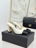 Chanel ladies mule sandals, white upper with black patent toe and block heel