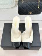 Chanel ladies mule heels pair, white with black patent toe, mid block heels