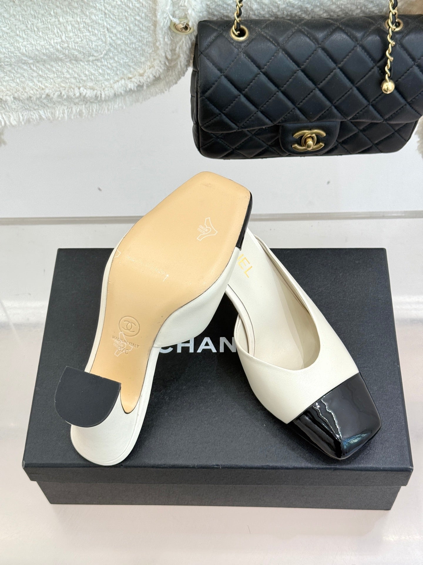 Chanel ladies mule heel, white upper with black patent toe and tan outsole