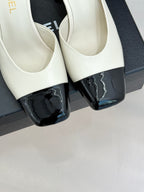 Chanel ladies mule toe detail, white upper with black patent toe cap