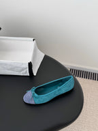 Turquoise ballet flat with bow detail, rounded toe, fabric upper