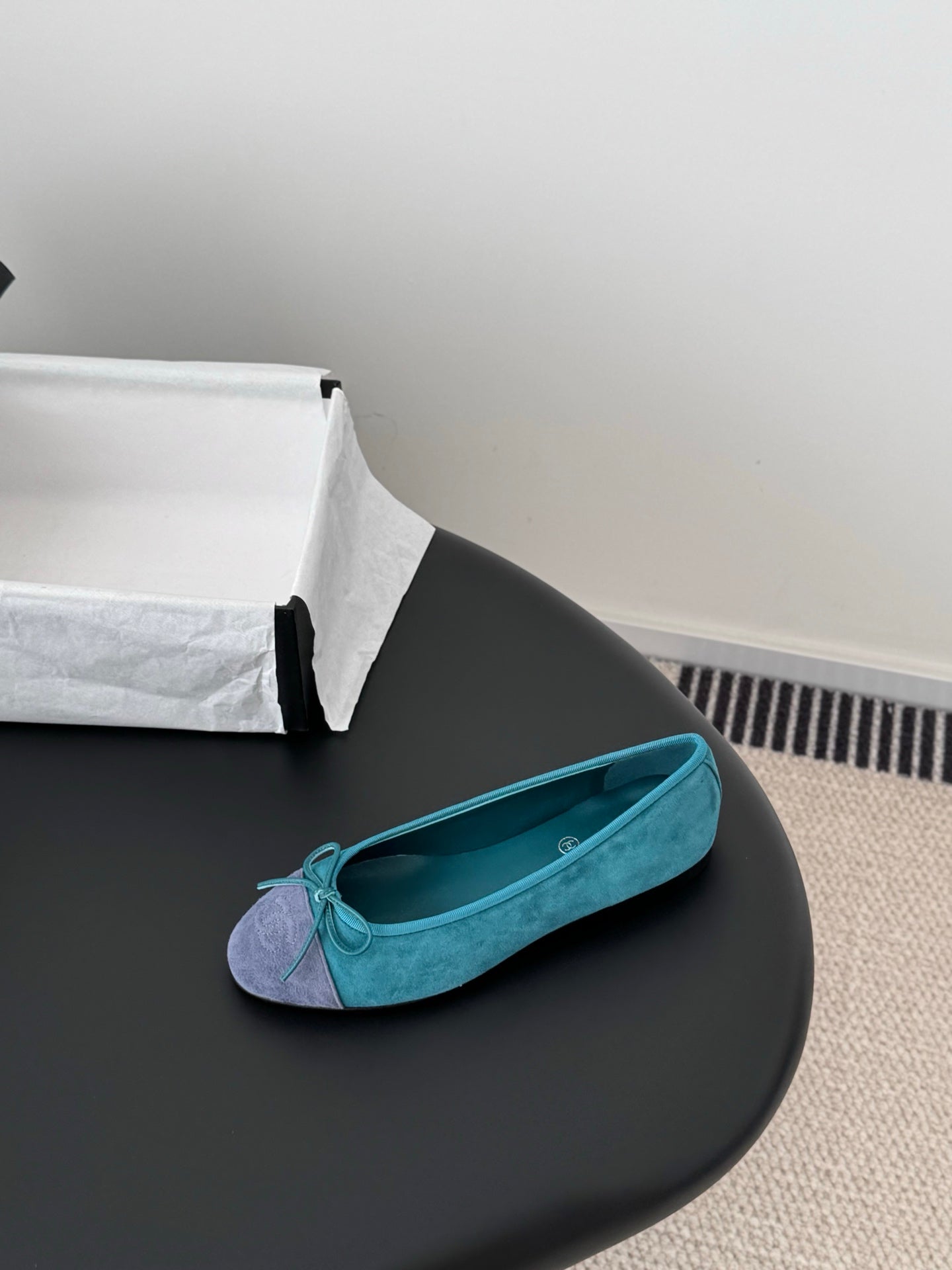 Turquoise ballet flat with bow detail, rounded toe, fabric upper