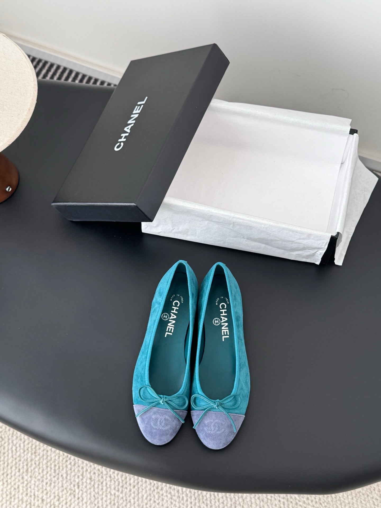 Turquoise ballet flats with bow at toe; fabric upper; Chanel logo on insole