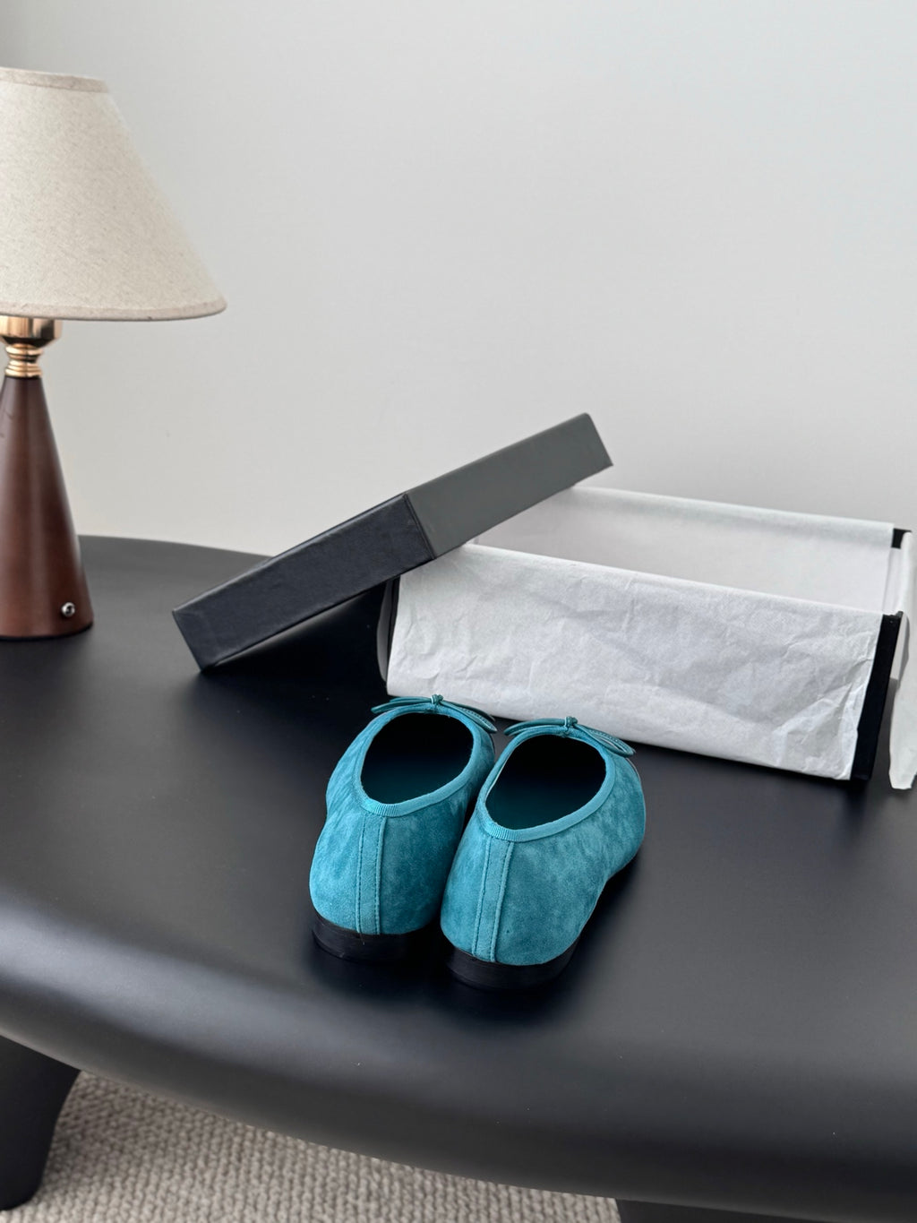 Turquoise ballet flats with bow, rounded toe, textured fabric upper